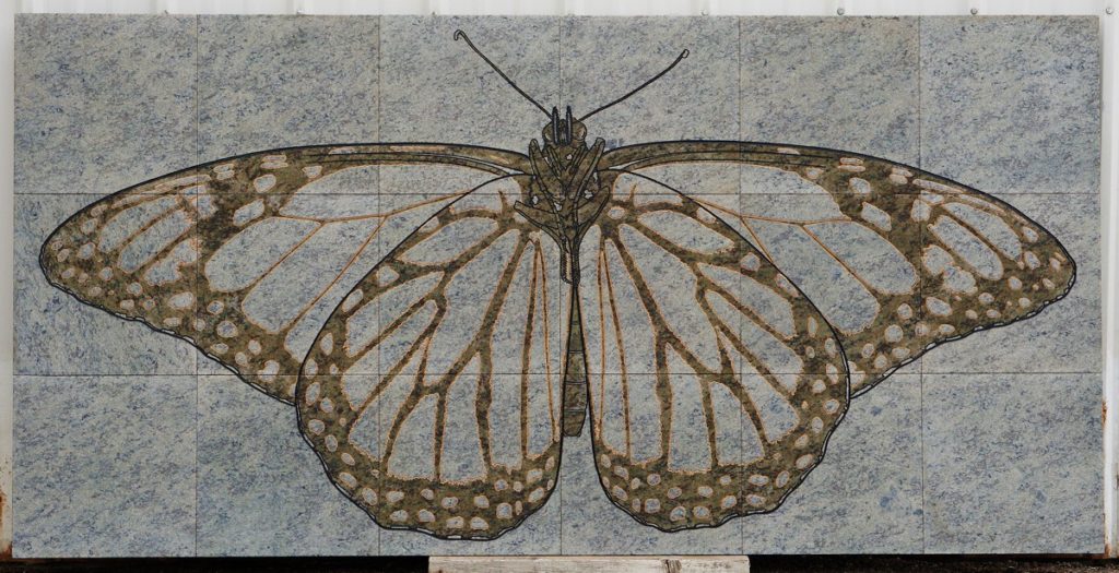 Monarch Butterfly engraved on 18 green granite tiles