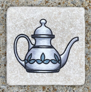 Marble tile with a teapot engraved and painted on it.