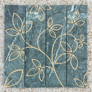 4 - 3in. x 12in. engraved green marble tiles, gold lacquer Four green marble tiles with leaves engraved and painted gold on them to make a single image.